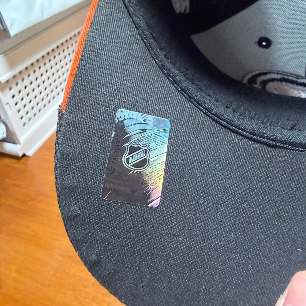 Reebok Philadelphia Flyers Hat Youth OSFM Black Orange NHL Center Ice Mesh Cap